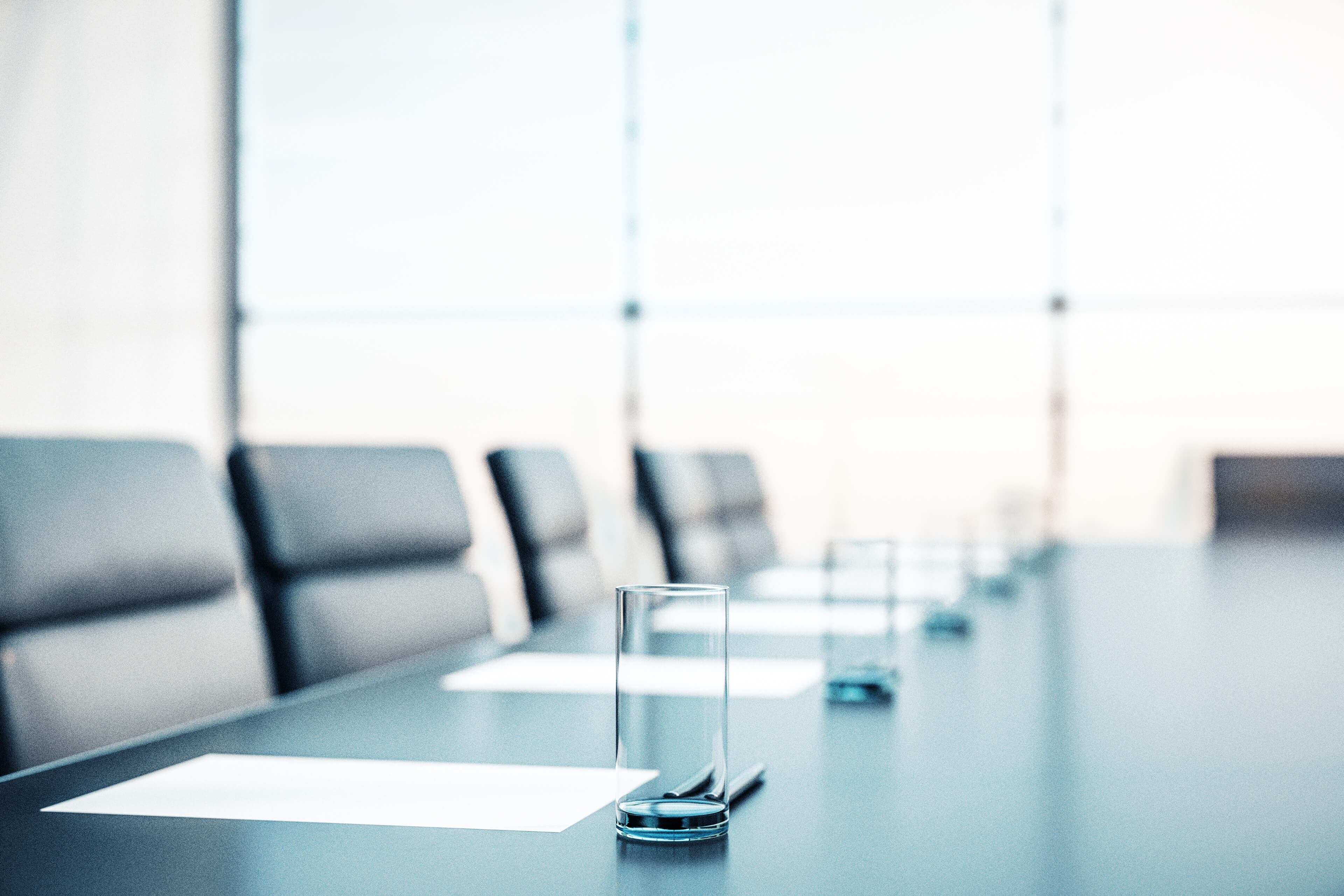 empty chairs in boardroom