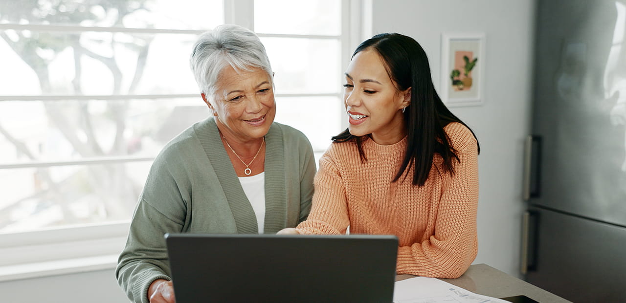 Smiling mother and daughter