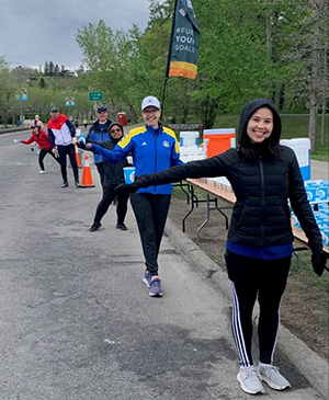 Giving out water at an event.
