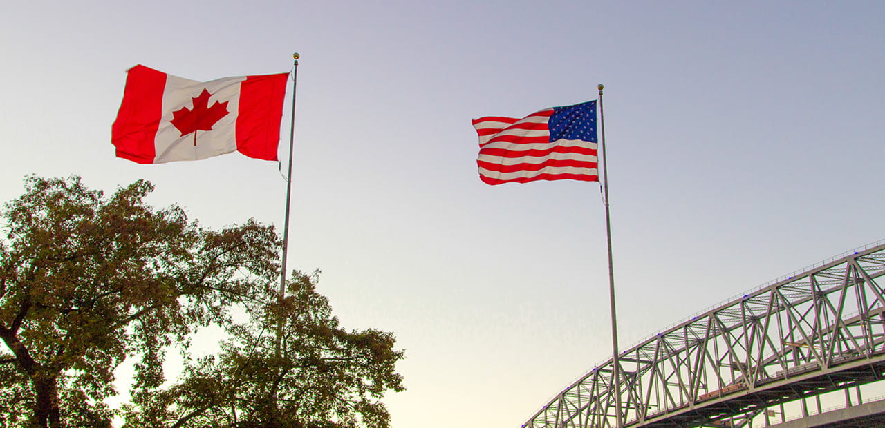 American and Canadian flags