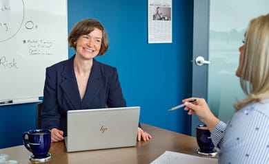 Two people in a meeting